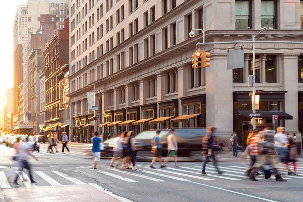 Pedestrians crossing a city street